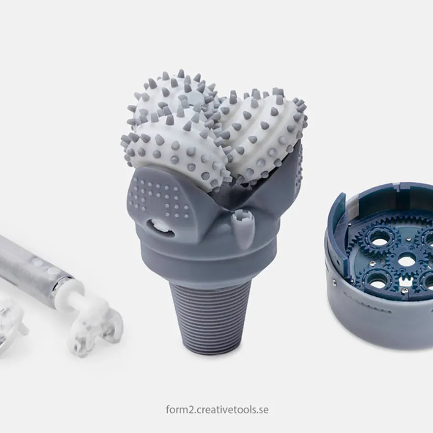 Finely detailed grey resin-printed drill-bit models